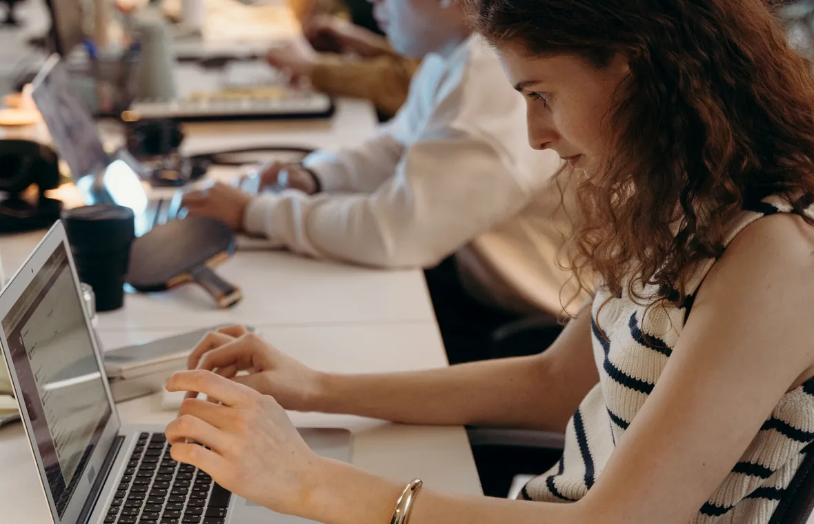 Technical specialists reviewing a secure financial software workflow