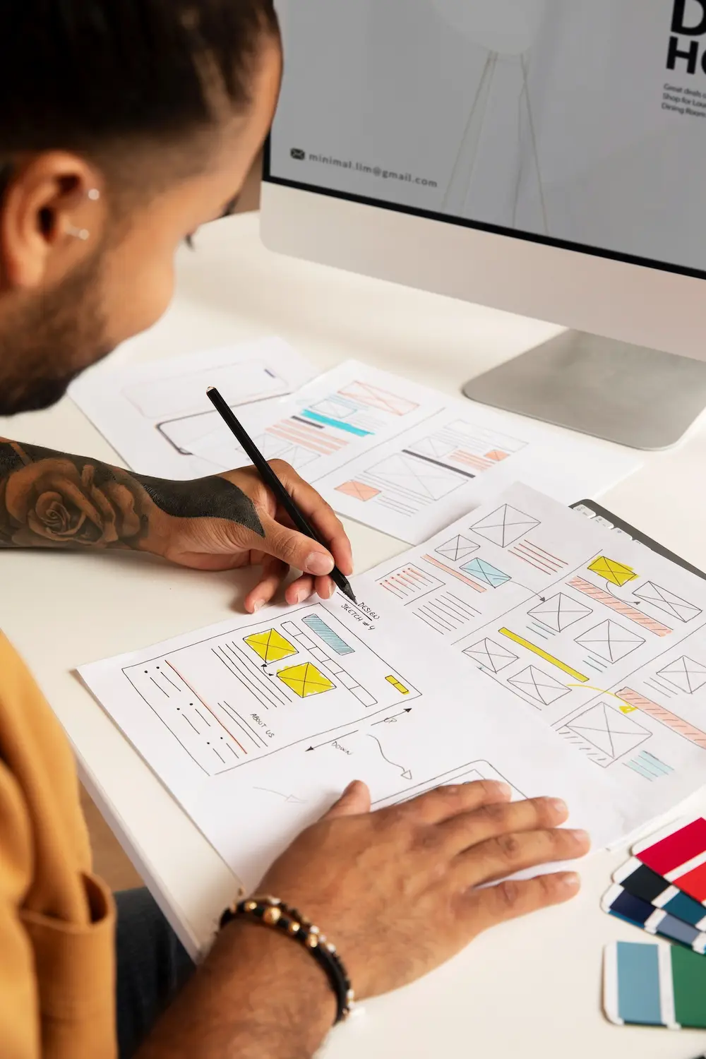 Mobile app developers collaborating on a digital product