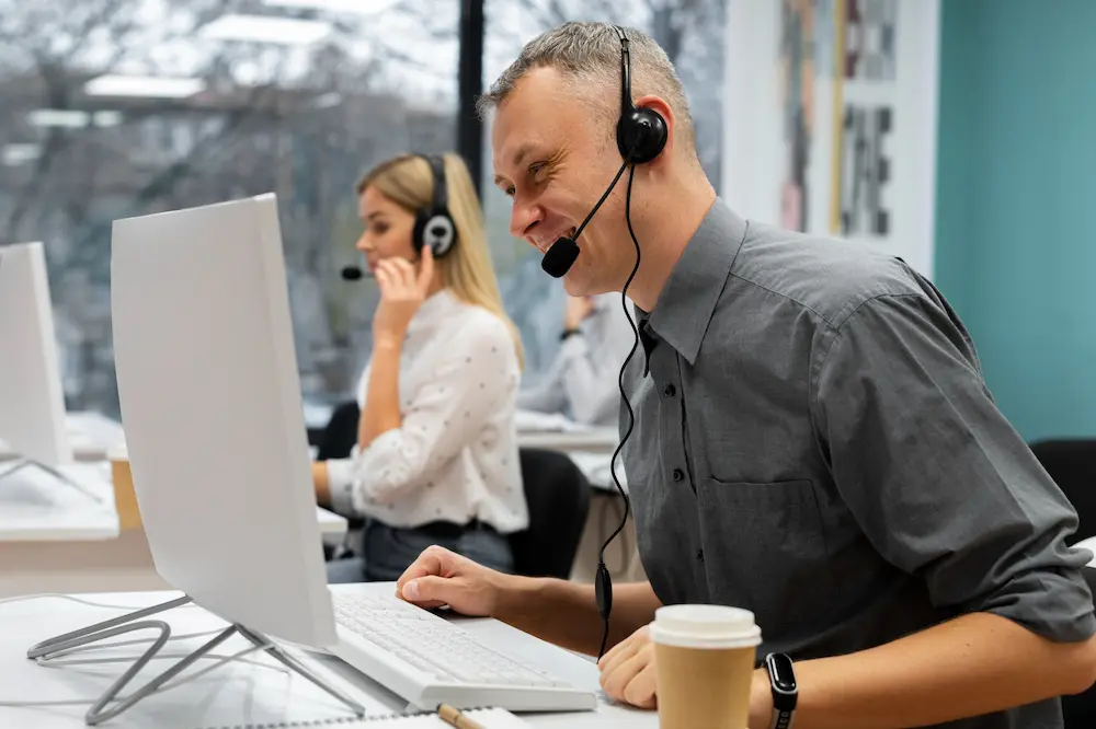Customer support professionals reviewing service workflows