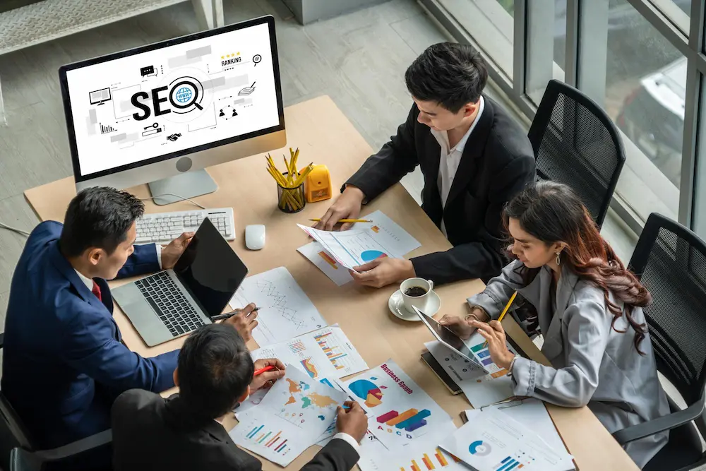 A remote marketing team collaborating on SEO strategy and performance